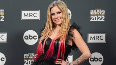 Avril Lavigne has her "favorite word" tattooed on her body three times -- guess what it is