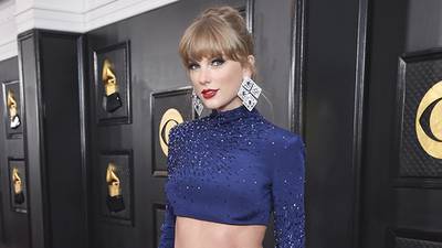 She can still make the whole place shimmer: Taylor Swift wore $3 million in jewels to the Grammys